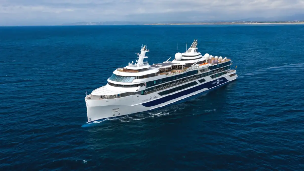 A small expedition cruise ship on deep blue water