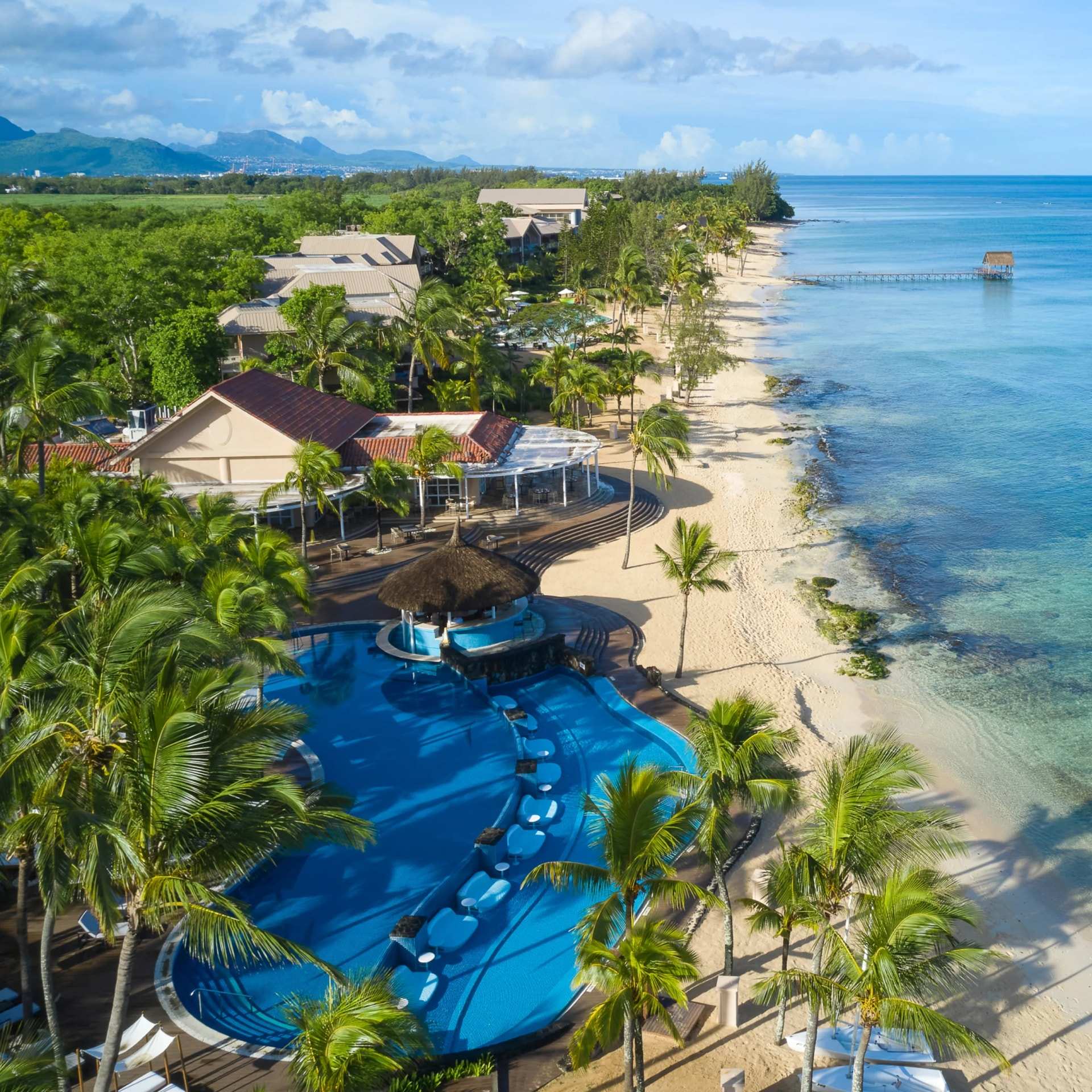 Turquoise lagoon and reef break below Le Morne Brabant, Mauritius