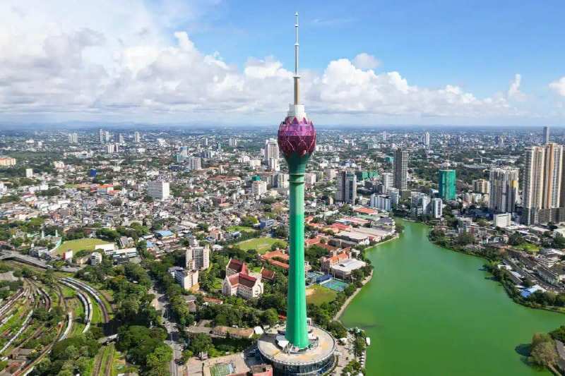 Colombo's Lotus Tower rising above the city, a lake at its foot