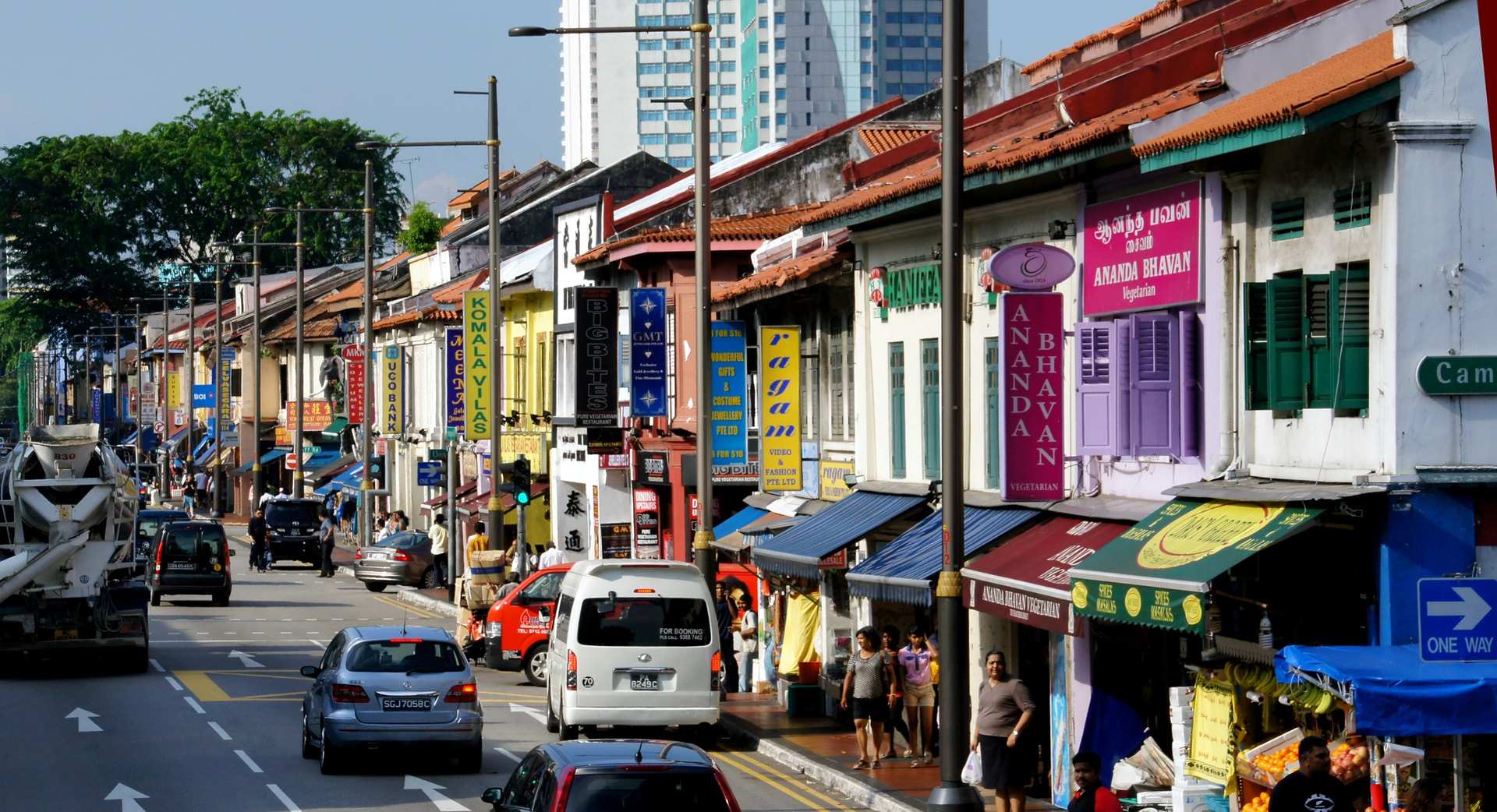 Painted shophouses and shop signs along Serangoon Road in Little India, Singapore
