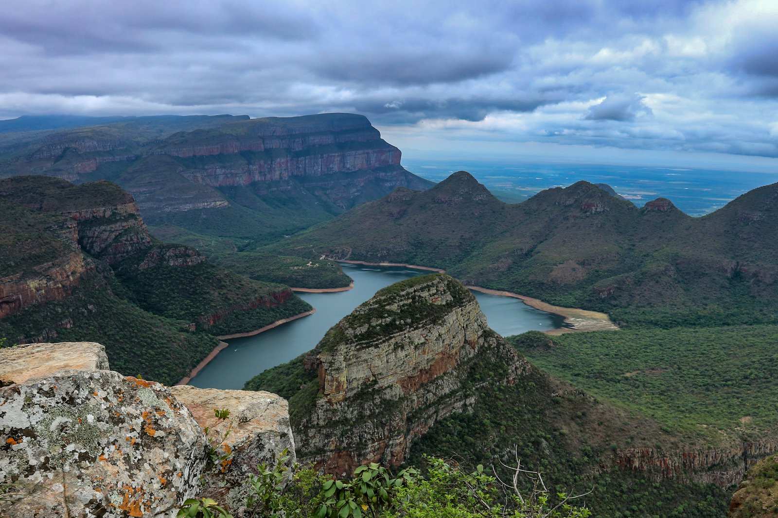 The Blyde River Canyon on the Panorama Route, its dam winding between flat-topped sandstone peaks